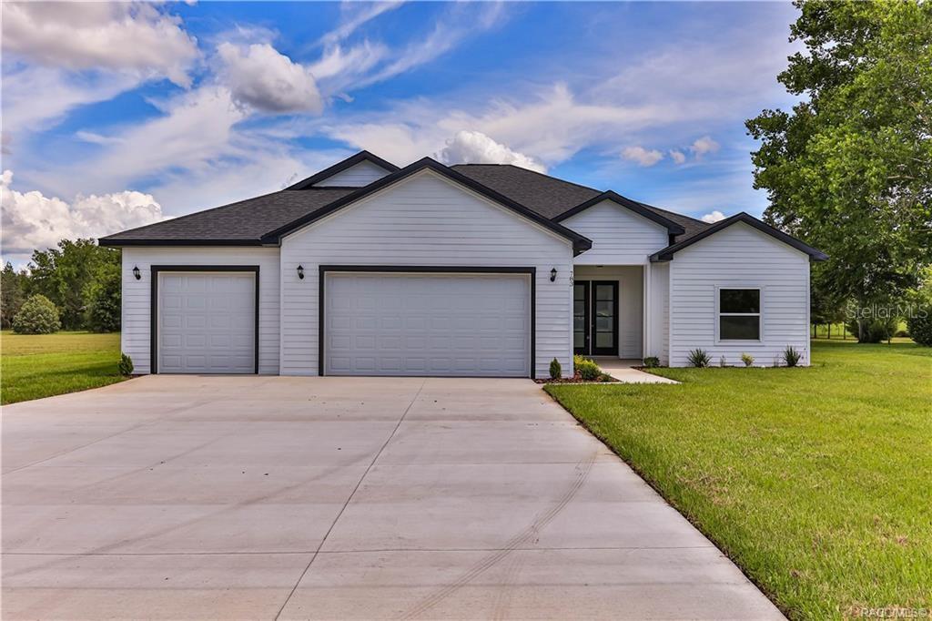 Brand new 2025 construction in the sought-after Citrus Hills community. This beautifully designed 4 bedroom, 2.5 bath home sits on a full acre and offers 2,319 square feet under air and 3,462 total square feet under roof. The open-concept layout features a spacious great room, gourmet kitchen with custom cabinetry and quartz countertops, and a large dining area for entertaining. The split floor plan provides privacy, with the owner’s suite offering dual vanities, a luxurious walk-in shower, and an oversized walk-in closet. High ceilings, durable and water proof LVP flooring, upgraded lighting, and a large interior laundry room enhance the home’s functionality and style. A three-car garage provides ample space for vehicles and storage. Enjoy the peaceful setting from the covered rear patio, with plenty of room to add a pool or garden. Located near golf, shopping, medical services, and dining, this new construction home offers the perfect blend of comfort, space, and convenience.