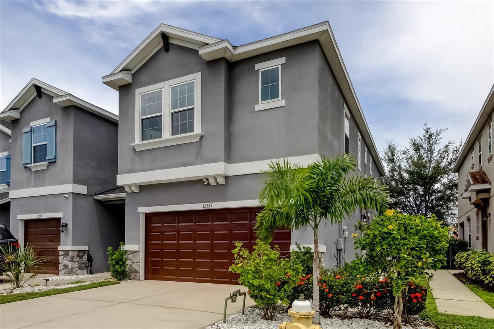 Rare Find! This 3-bedroom townhome with a 2-car garage features an open floor plan, upstairs loft and laundry room, and water views from both the front and back. Enjoy the outdoors from the screened lanai. Built in 2017 and never flooded during the 2024 hurricanes. Includes brand new microwave, oven and dishwasher.
Conveniently located on the edge of Pinellas and Hillsborough County, just 15 minutes from Tampa International Airport, and minutes from R.E. Olds Park in Oldsmar—known for its weekend festivals and community events. Walking distance to Upper Tampa Bay Park one of Hillsborough county's most popular county parks, offering canoe rentals, nature trails, fishing docks, and summer camps. Located in one of the most top rated school zones in Hillsborough County.
Townhomes with a 2-car garage in this area are extremely rare—don’t miss this one
