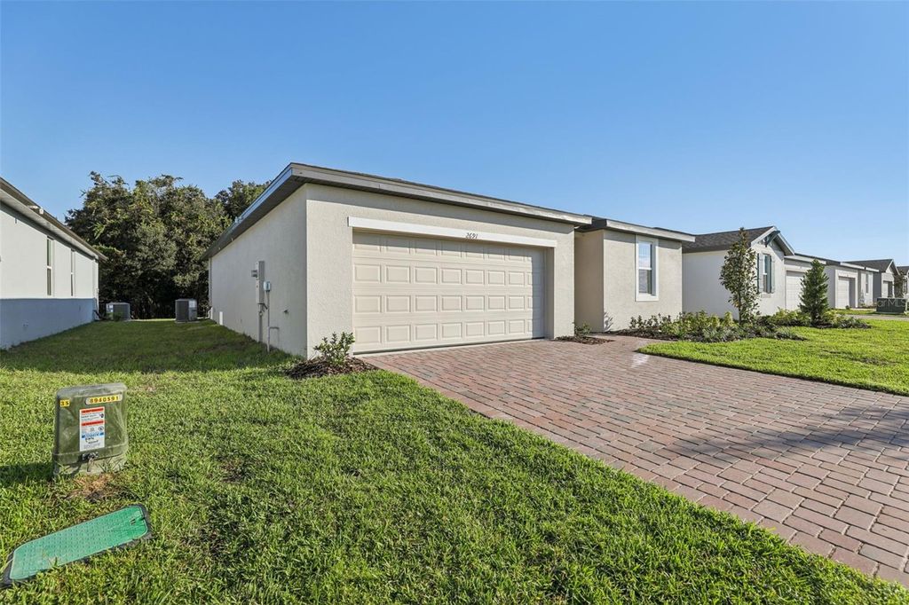 Photo of 2691 Sedgefield Circle, Haines City, FL 33844 (MLS # O6343036)