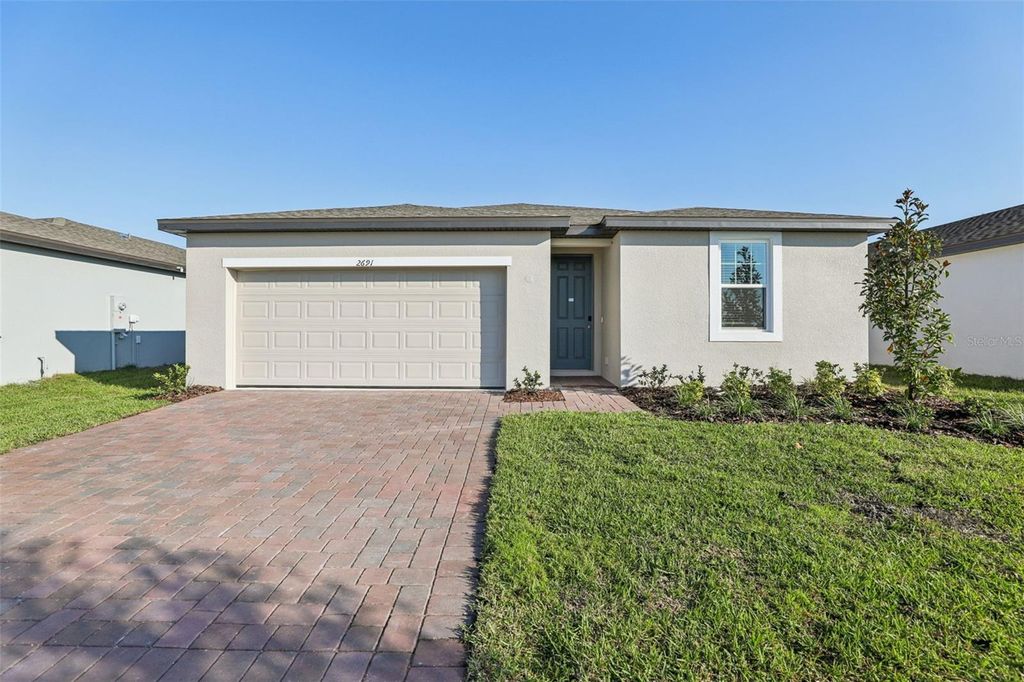 Photo of 2691 Sedgefield Circle, Haines City, FL 33844 (MLS # O6343036)