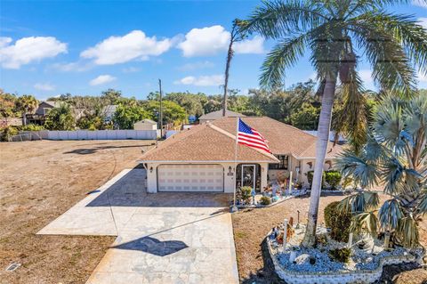 Photo of 2298 Cedarwood Street, Port Charlotte, FL 33948 (MLS # C7513489)