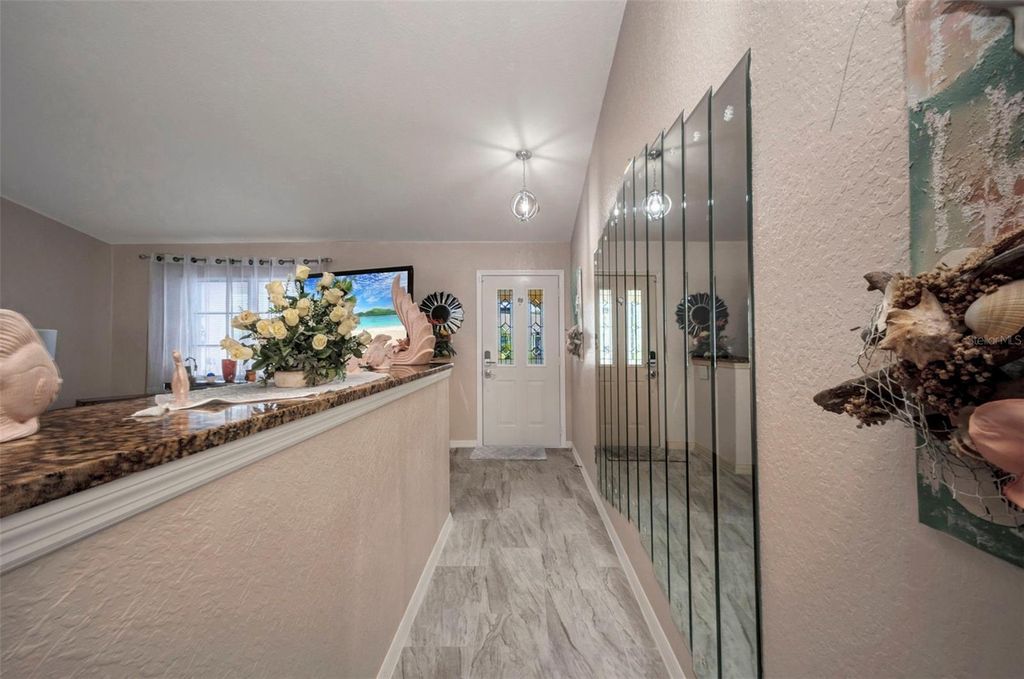 Photo of 2298 Cedarwood Street, Port Charlotte, FL 33948 (MLS # C7513489)