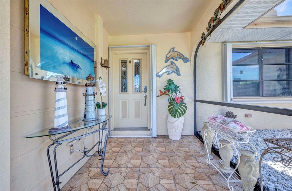 Photo of 2298 Cedarwood Street, Port Charlotte, FL 33948 (MLS # C7513489)