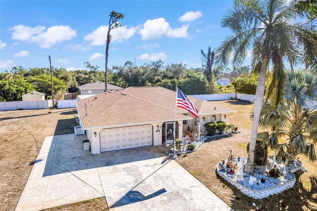 Photo of 2298 Cedarwood Street, Port Charlotte, FL 33948 (MLS # C7513489)