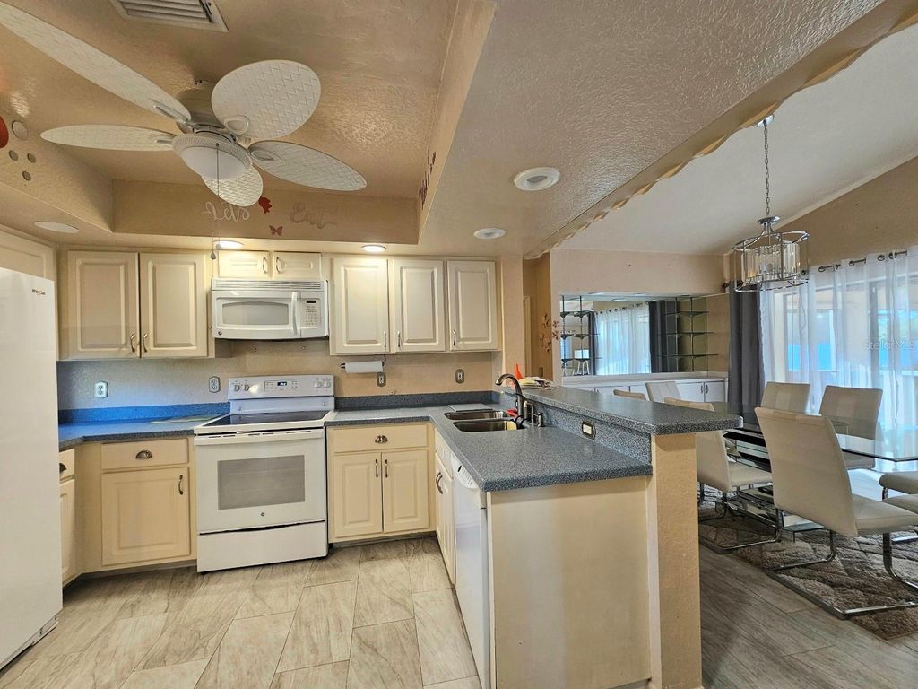 Photo of 2298 Cedarwood Street, Port Charlotte, FL 33948 (MLS # C7513489)