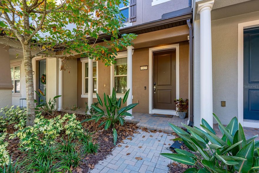 Ask about a lender provided RATE BUY-DOWN CREDIT on this home ** Seller may consider buyer concessions if made in an offer ** Welcome to Lakeview Pointe, where modern townhome living meets one of the most sought-after locations in Horizon West! This rare 2-bedroom townhome stands out in the Winter Garden area, offering the highly desirable layout of TWO TRUE EN-SUITE BEDROOMS, each with its own full bathroom and WALK-IN CLOSET – plus a convenient main-floor half bath and a large laundry room. From the moment you arrive, the home’s curb appeal and well-maintained community set the tone. Inside, the fully OPEN CONCEPT DESIGN allows the living room, kitchen, and dining area to flow seamlessly together, creating a light, bright, and airy feel that’s perfect for both everyday living and entertaining. Low maintenance TILE FLOORS span the main living areas, while plush carpeted bedrooms provide a cozy retreat upstairs. Double-pane windows, upgraded fixtures, and modern fans add to the MOVE-IN READY appeal. The kitchen is truly the heart of the home and a dream for any family chef, featuring warm solid wood cabinetry, sleek countertops, STAINLESS STEEL APPLIANCES, recessed and pendant lighting, and a large island with bar seating. The space opens effortlessly to both the living and dining areas, making it ideal for hosting or relaxing at home. The second floor delivers a generous primary suite complete with a walk-in closet and a well-appointed en-suite bath. The second bedroom is equally spacious, complete with its own walk-in closet and private en-suite bath access – an ideal setup for guests, roommates, or flexible living. Step outside to enjoy the COVERED FRONT PORCH or unwind on your private FULLY FENCED PAVER PATIO, perfect for morning coffee or evening downtime. The 2-CAR REAR FACING GARAGE provides excellent parking, storage, and everyday convenience. Lakeview Pointe residents enjoy access to a COMMUNITY POOL, playground, and fitness center, all within a beautifully kept neighborhood. Located in the rapidly growing Horizon West area, you are surrounded by new shops, dining, and everyday conveniences, with quick access to SR-429, Disney parks, resort areas, and everything Central Florida has to offer. Zoned for TOP-RATED SCHOOLS, this townhome delivers the ultimate in comfort, style, and an unbeatable location – WELCOME HOME!