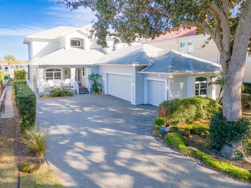 Photo of 119 S Riverwalk Drive, Palm Coast, FL 32137 (MLS # FC315251)