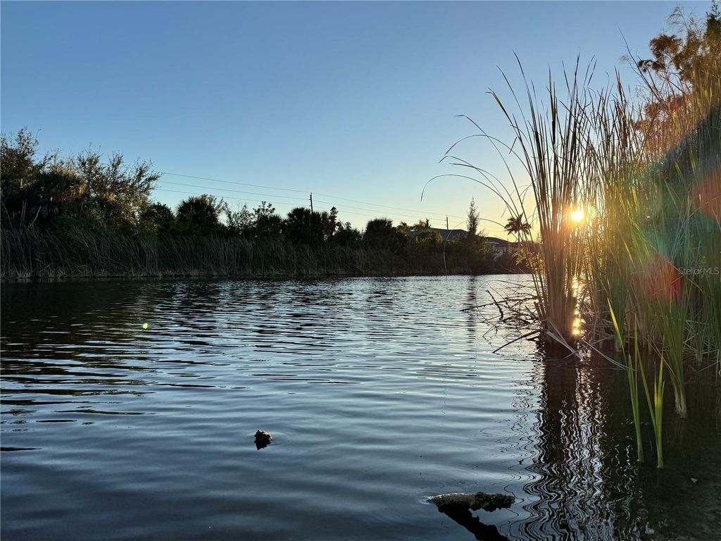 Photo of 15512 Lakeland Circle, Port Charlotte, FL 33981 (MLS # D6146031)