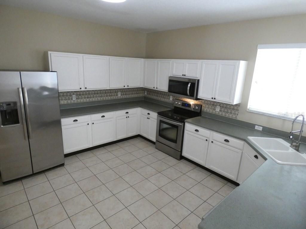 Photo of 19726 Timberbluff Drive, Land O Lakes, FL 34638 (MLS # W7882401)