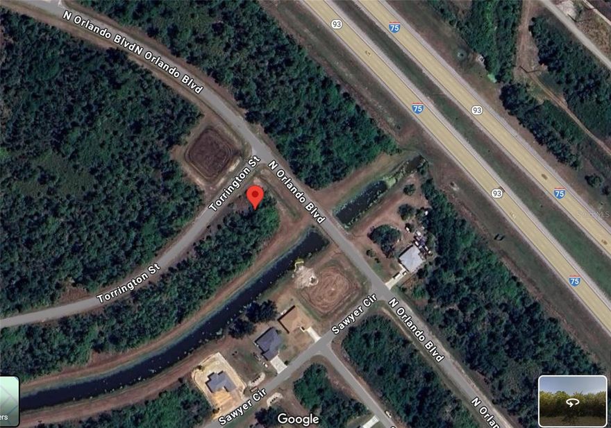 This corner lot of 0.34 acre sits right next to I-75 with high traffic counts.
The property is located in a fast growing area close to Walmart, Publix, national hotels and restaurants. 
The zoning AC-10 allows a number of commercial and residential uses, inlcuding but not limited to multiple family, restaurants, retail service, warehouse, office, school etc.