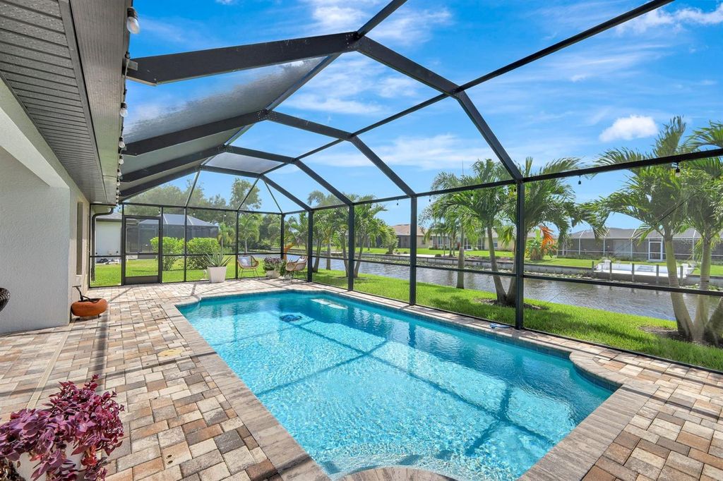 Photo of 1410 SW 12th Terrace, Cape Coral, FL 33991 (MLS # TB8434929)