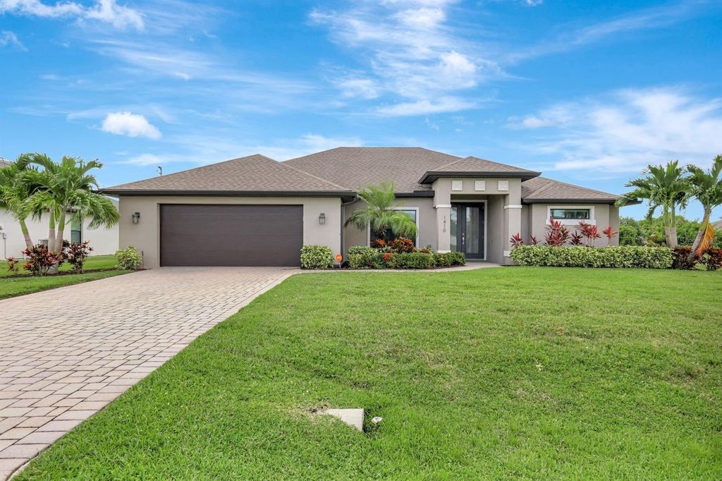 Photo of 1410 SW 12th Terrace, Cape Coral, FL 33991 (MLS # TB8434929)