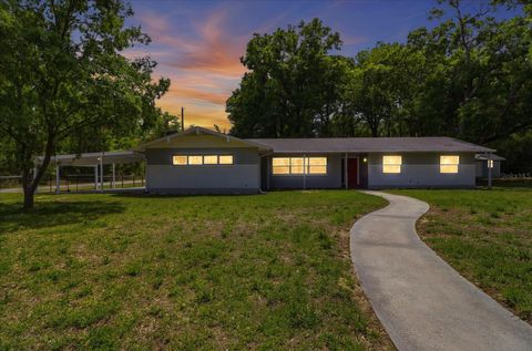 Photo of 24576 NW Falcon Avenue, Dunnellon, FL 34431 (MLS # OM721759)