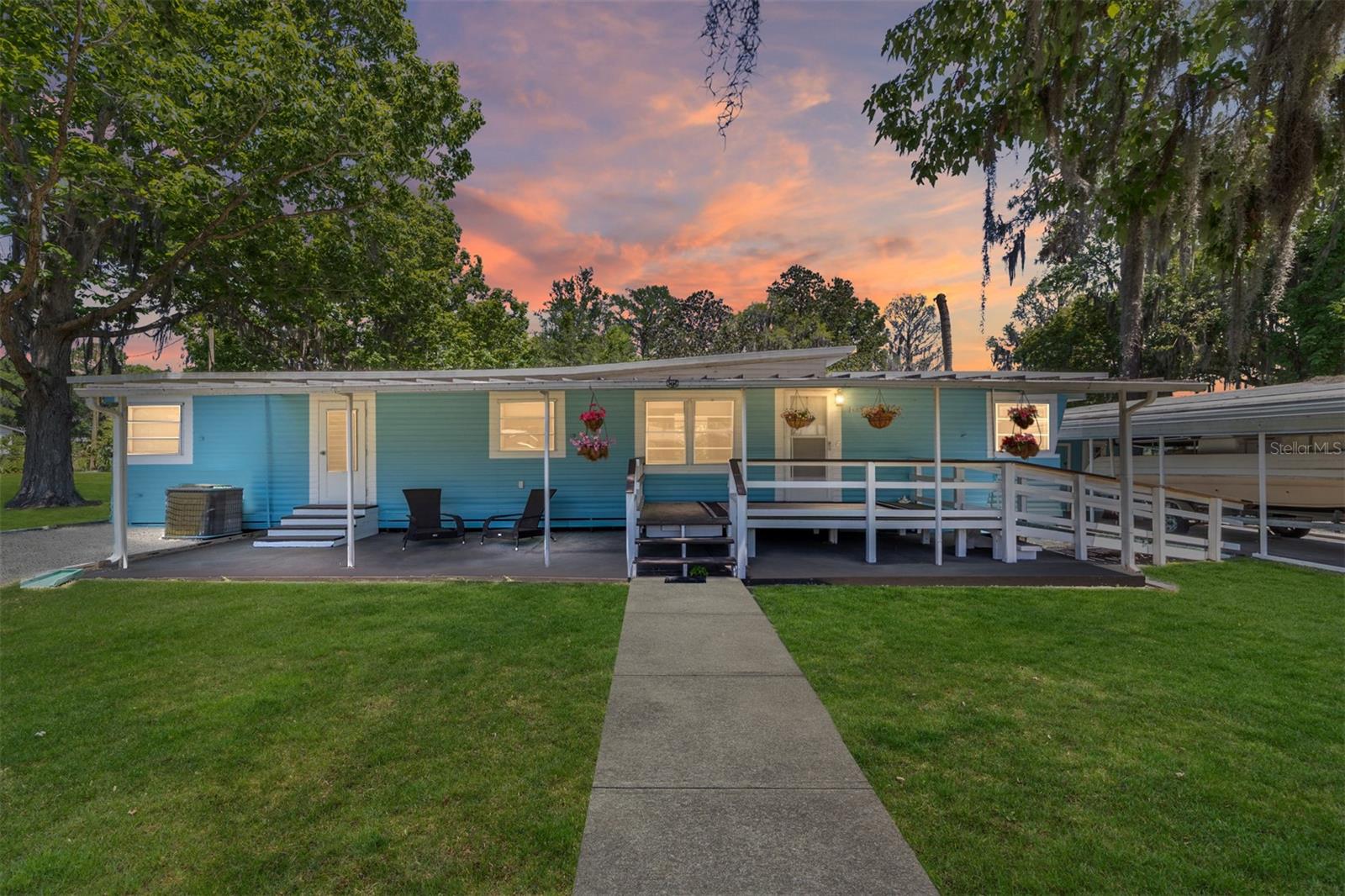 PRICE IMPROVEMENT!! This well-kept 2 bedroom 1.5 bath home sits on a half-acre made up of two lots, offering a peaceful setting with plenty of space to enjoy. The property includes two storage sheds for your tools, fishing gear, or outdoor equipment, plus a covered carport to keep your vehicle or boat protected. A private boat ramp gives you direct canal access to Lake Rousseau, making it easy to launch your kayak or cast a line just steps from your door.
Inside, the home is clean, functional, and move in ready. Perfect for full time living, weekend getaways, or as a rental investment. Whether you're relaxing on the porch or spending the day on the water, this property offers a laid back lifestyle that’s hard to match at this price.
Lake Rousseau is spring fed and known for its world class bass fishing, with calm waters that connect to the Rainbow and Withlacoochee Rivers. You're just minutes from historic Dunnellon, Rainbow Springs, and an easy drive to Crystal River, Homosassa, and the Gulf. With nature, small town charm, and outdoor adventure all nearby, this home delivers the best of Florida’s Nature Coast.
If you’ve been looking for an affordable waterfront home with storage, parking, and private water access, this is the one.