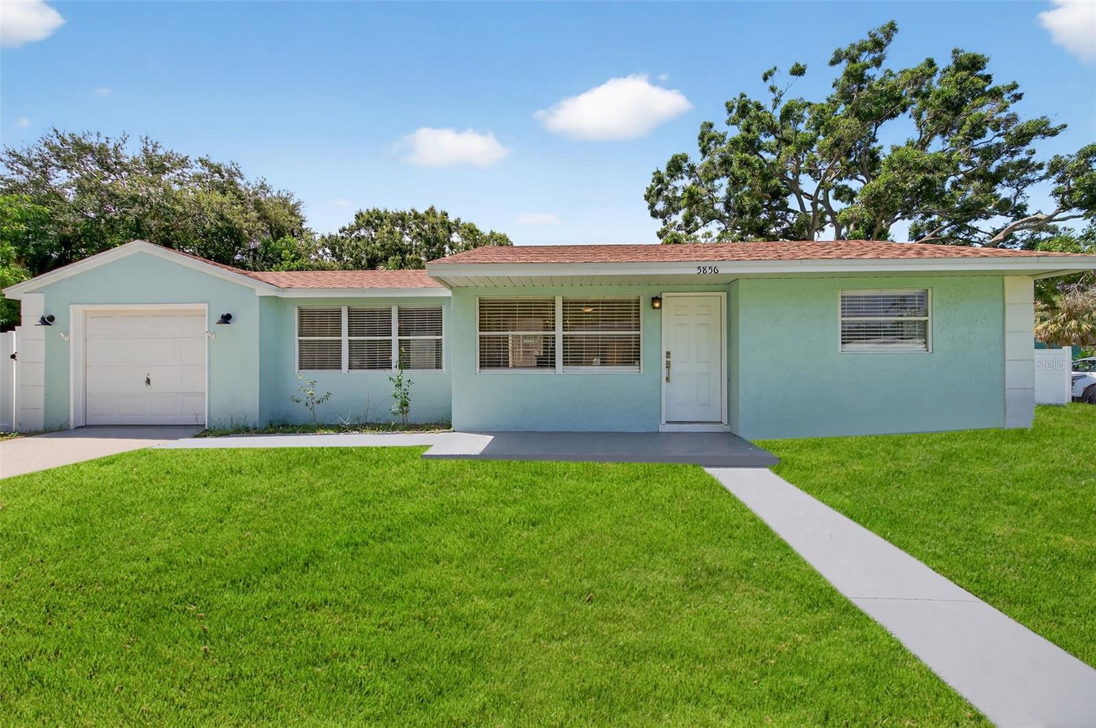 Adorable Gulfport —NOT IN A FLOOD ZONE! This charming 2-bedroom, 1-bath home features a 1-car garage with washer and dryer included in the lease. Enjoy a HUGE Fenced backyard, perfect for entertaining or gardening. The home boasts an updated kitchen with granite countertops, a dishwasher, and a cozy dining room with a beautiful wood-paneled ceiling. Major updates include a new roof (2021) and new AC ducts (2025). Ideally located near the Pinellas Trail, downtown Gulfport, waterfront parks, and Williams Pier. Excellent landlord and move-in ready!