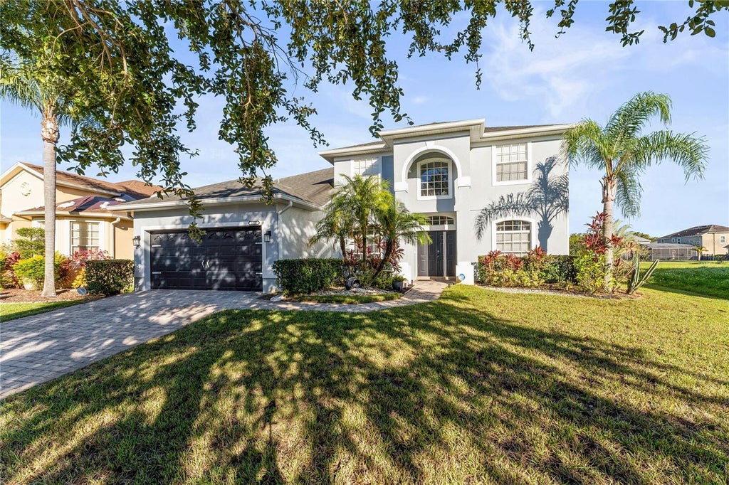Photo of 5975 Winchester Isle Road, Orlando, FL 32829 (MLS # O6450633)