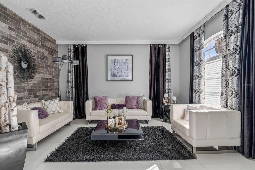 Photo of 5975 Winchester Isle Road, Orlando, FL 32829 (MLS # O6450633)