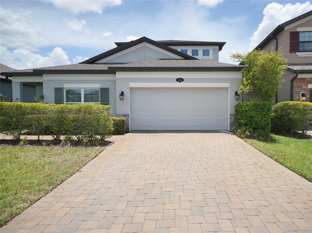 Photo of 19460 Blossom Vine Lane, Lutz, FL 33558 (MLS # TB8523752)