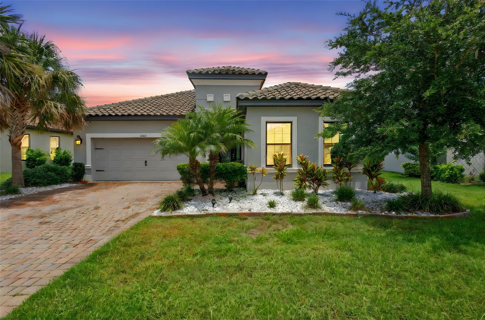 Step into your private oasis in this beautifully maintained 4-bedroom, 3-bath lakefront home, where luxury meets lifestyle at every turn. Enjoy warm Florida days in the stunning saltwater PebbleTec pool with spa jets, then take a stroll to your private boat dock for an afternoon cruise or fishing adventure on Lake Tohopekaliga. Inside, the home features a chef-inspired kitchen with quartz countertops, 42” upgraded cabinetry, and modern stainless steel appliances. The open-concept living area includes surround sound wiring, while thoughtful touches like updated landscaping and pre-plumbing for a water softener add everyday comfort. Set in a sought-after, guard-gated community offering a full suite of upscale amenities including several resort-style pools, a fitness center, on-site restaurant and bar, water park, sports courts, and lively events for all ages. Whether relaxing poolside or exploring the lake, this home offers a seamless blend of elegance and ease. Note: All chandeliers and the master bath light/fan will be replaced with sleek recessed LED downlight retrofit fixtures.