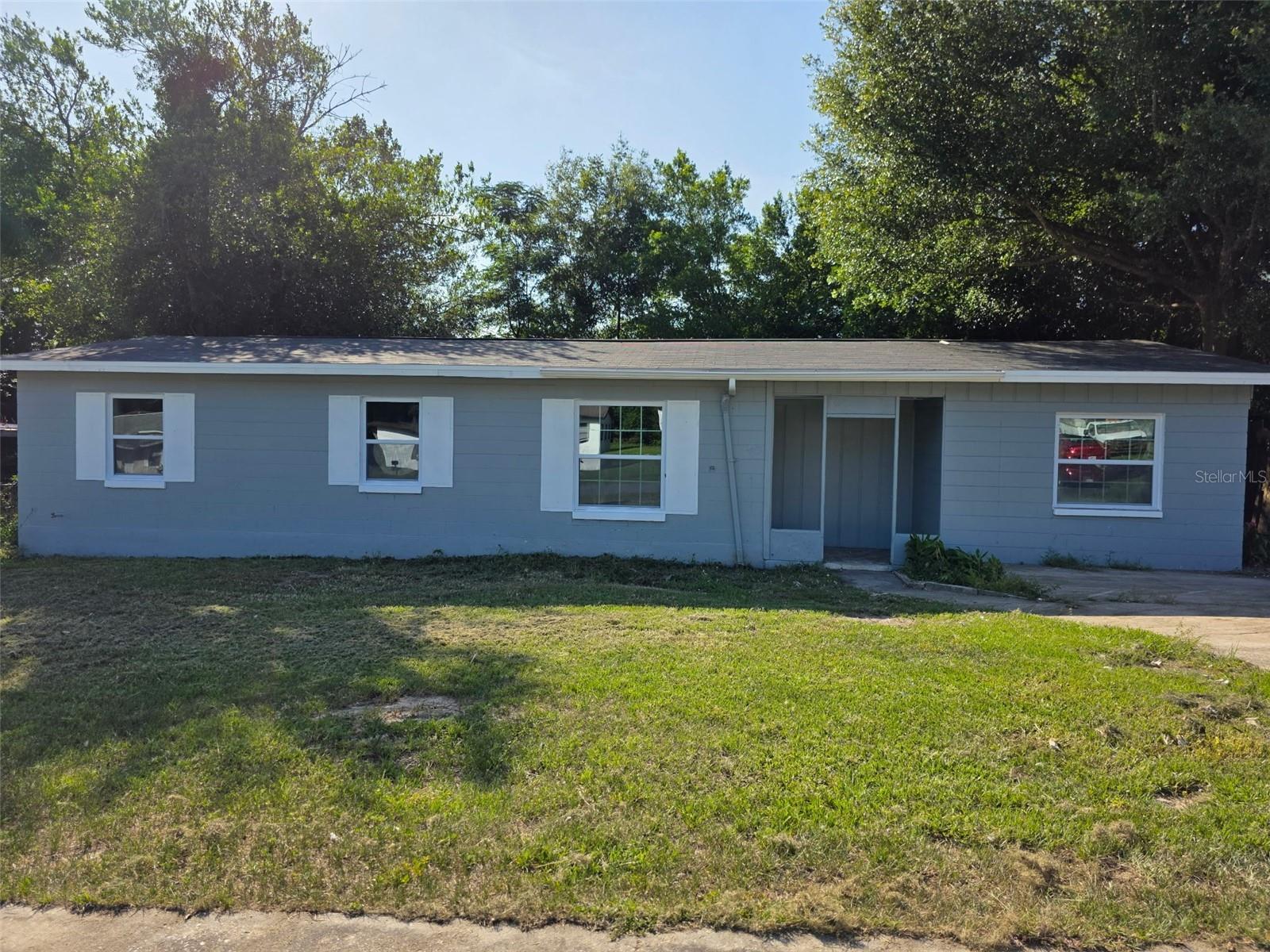 Welcome to 1869 Freeman Place, Citrus Springs, FL! This beautifully renovated 1,272 sq ft single-story block home combines modern updates with classic Florida charm. Step inside to discover a fresh, contemporary interior featuring a brand-new kitchen and fully updated bathrooms, all designed with style and functionality. The kitchen opens seamlessly into the dining and living areas, creating an inviting and spacious layout perfect for entertaining or everyday living. Enjoy the comfort of all-new flooring, windows, and doors throughout the home—every detail has been thoughtfully upgraded.  The main section of the house has three generously sized bedrooms and a new bathroom.  On the opposite side of the living area is a large bonus room and a mudroom, both with outside entrances, and another new bathroom.  The private backyard has a large in-ground pool and patio.  This is a one-of-a-kind rental property great for year-round living.