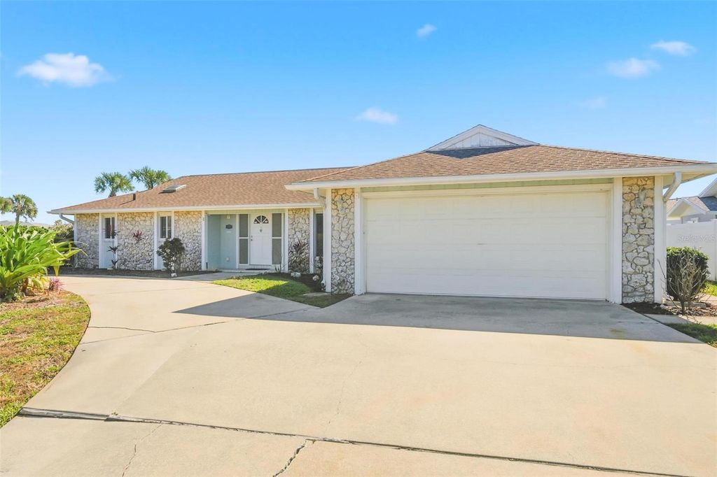 Photo of 33 E Sea Harbor Dr, Ormond Beach, FL 32174 (MLS # FC313899)
