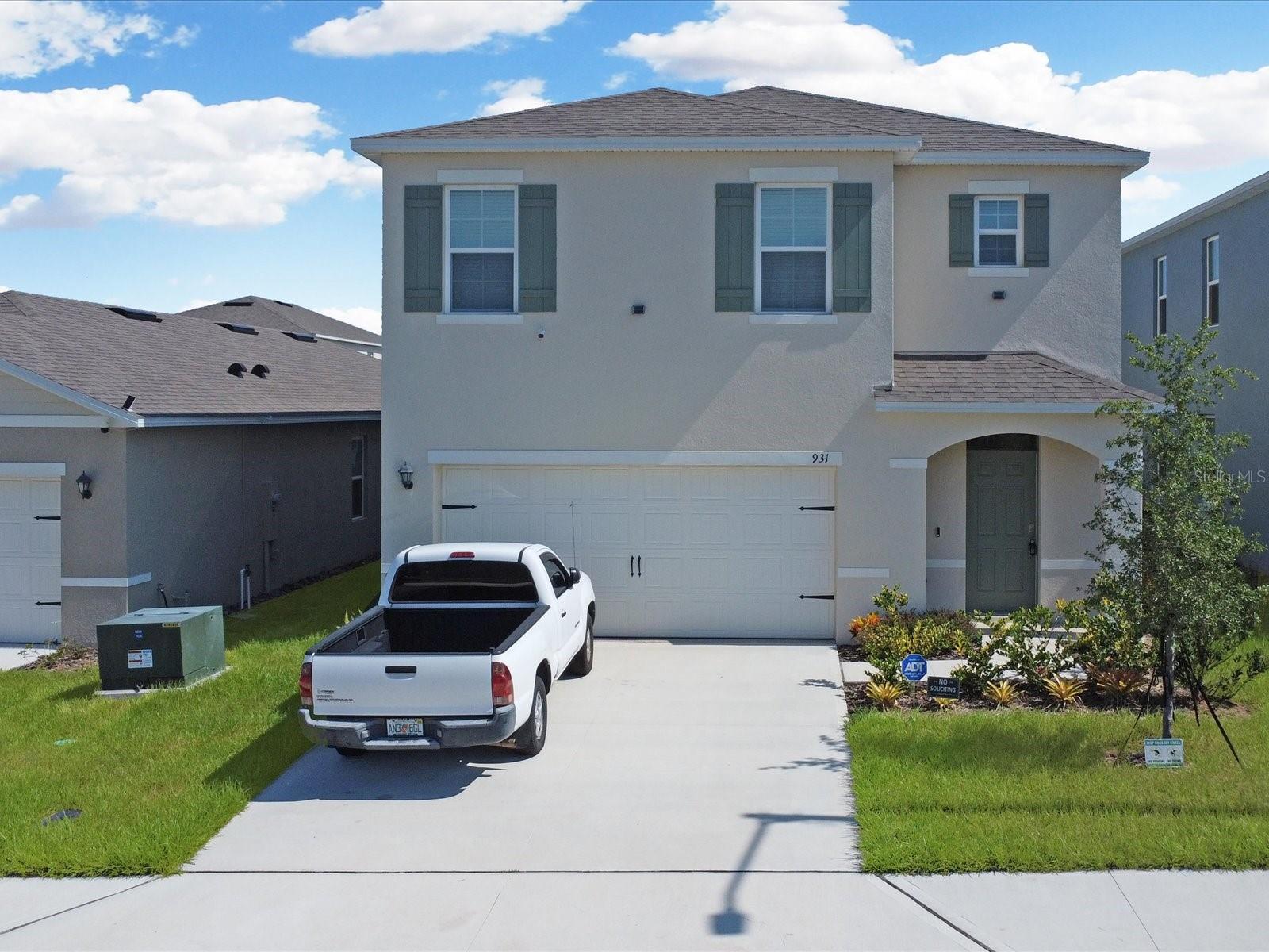 Welcome to your home that is just like new. only one year old, This D.R. Horton , Robie model is a two-story floor plan featured in the beautiful Cascades in Davenport, Florida.
Inside this inviting 5-bedroom, 3-bathroom home, you’ll find 2,522 square feet of comfortable living. This impressive all-concrete block construction, two-story plan features a versatile floor plan to fit your needs. A spacious open-concept first floor, which includes a well-appointed kitchen with sleek stainless-steel appliances just like new, overlooking the living and dining area. Just off the living room, you will find the singular downstairs bedroom and full bathroom.
As you move upstairs, you are greeted with a spacious living room and foyer space to utilize for work or play. The primary bedroom one is located just off the loft space and features a spacious walk-in closet as well as an ensuite bathroom with double vanity and all the space you need to get ready in the morning. Three additional bedrooms share a second upstairs bathroom and linen closet for extra storage. Your laundry room is located on the second floor, as well as extra storage closets.
Like all homes in Cascades, the Robie includes smart home technology, which allows you to control your home anytime with your smart device while near or away.
