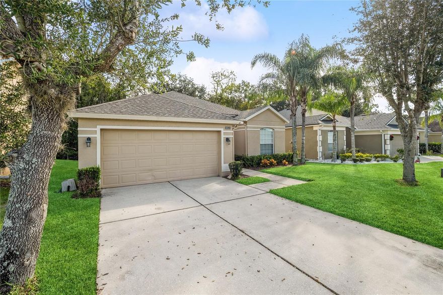 Step into your sanctuary in Tivoli Woods with this meticulously maintained 3-bedroom, 2-bathroom family home. This one-story gem boasts a brand-new roof (2021) and a freshly painted exterior, ensuring lasting peace of mind. Inside, you'll find a spacious living room and family room, perfect for creating lasting memories with loved ones. Imagine cozy nights, engaging in board game battles, or simply enjoying quality time surrounded by warmth and laughter. The updated owner's bath provides a haven for relaxation, while the granite countertops and 42-inch cabinets in the kitchen inspire culinary creativity. All three bedrooms are generously sized and offer comfortable retreats. The screened back patio, accessible through sliders from the master and living room, beckons you to unwind and enjoy moments of peace in the fresh air. This private oasis backs up to a stunning nature preserve, offering an unparalleled sense of serenity. Embrace the tranquility of your own natural sanctuary. Less than 10mins from supermarkets, stores and eateries. Only 15mins to the Airport, Lake Nona and or Waterford Lakes. This is the home you've been searching for so dont delay!