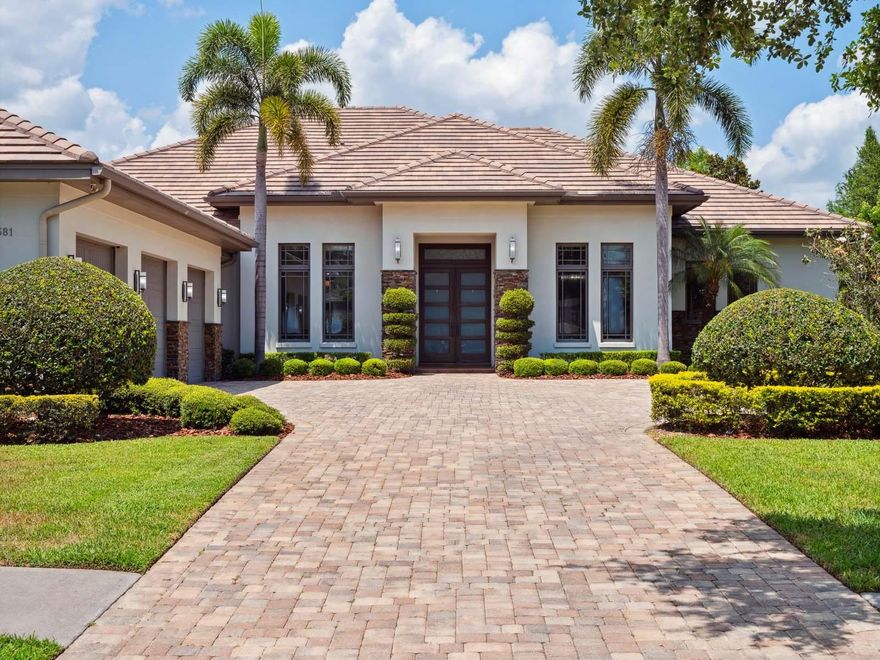 Custom built in 2015 by Maroon Fine Homes, this beautiful single-story residence is perfectly situated within the gates of Lake Nona Golf & Country Club in proximity to all that the Club has to offer. 

Designed for indoor and outdoor living, this home offers four bedrooms, four full and one half bathrooms plus more than 2,500 square feet of exterior living space overlooking sparkling water views.  

Featuring warm and modern interior design, by Niemann Interiors, the home strikes a perfect balance of relaxed elegance. Walnut wood floors travel throughout the interior, from the foyer and great room to the kitchen, dining room and dedicated home office. 

Beautiful finishes including smooth stained beams in the great room, along with extensive interior architectural details further enhance these primary living areas. The kitchen offers a walk-in pantry, waterfall center island, appliances by Wolf and Sub-Zero and rich, custom all-wood cabinetry.   

The home’s outdoor living area features an expansive pool colonnade with a covered walkway leading from the owner’s suite to the media/game room. With additional, glass sliders providing access from both the dining room and the great room, the covered lanai features a summer kitchen and a freestanding, three-sided fireplace. This relaxing retreat creates the perfect place to enjoy warm Florida evenings. 

Additional features include: 
• Private Owner’s Suite with expansive walk-in closet, spa tub and walk-in shower 
• Spacious Laundry Room
• Pool Bath 
• 3-Car Garage