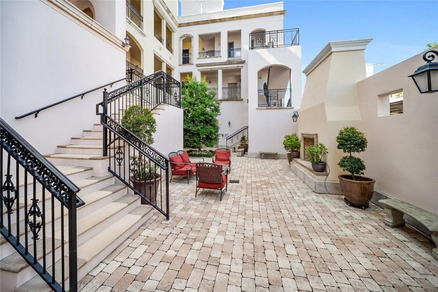 Huge reduction and priced to sell! Indulge yourself in the epitome of urban sophistication at this top floor, two-bedroom, two-bath residence situated in the heart of Sarasota's Rosemary District and 5 minitue walk to main street downtown. As you enter this luxurious home, prepare to be captivated by its refined details and impeccable design.

The spacious open floor plan is tailor-made for hosting memorable gatherings with friends or family. The master suite offers a private haven where you can unwind after a long day,fabulous modern finishes in the bathroom and boasting a walk-in closet that will cater to your wardrobe needs and Relish in the enchanting sounds of violinists from nearby establishments on your Juliette balcony while savoring a glass of wine. The southern exposure allows an abundance of natural light to flow throughout, creating a bright and airy atmosphere.

The attention to detail is apparent freshly painted inside with the high 10' ceilings, a coffered ceiling in the living room that exudes elegance, all-wood cabinetry with upgraded door styles and finishes, stainless appliances, and beautiful granite countertops in the gourmet kitchen. Solid doors, upgraded moldings, and exceptional sound insulation ensure a peaceful environment for you to unwind in.

Outside, discover a tranquil courtyard with a lounge area and an outdoor fireplace, perfect for enjoying Sarasota's pleasant evenings. The unit features wood-look ceramic tile flooring throughout, adding to its aesthetic appeal while providing durability and easy maintenance. The luxurious walk-in shower is the finishing touch of elegance in your daily routine.

Located near the best that downtown Sarasota has to offer - including fine dining options, galleries, boutiques, and the farmer's market - you will never be short on things to do. Adding to its already eco-friendly features, this residence comes with an accessible EV charging port for your electric vehicle.

Embrace the sophistication of urban living in Sarasota's Rosemary District by scheduling a viewing today and experiencing the essence of luxurious sophistication in one of Florida's most sought-after neighborhoods