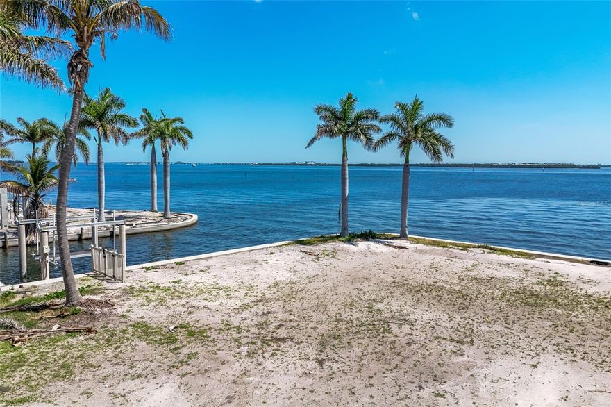 This waterfront corner lot offers a rare chance to build your custom coastal retreat on an expansive quarter-acre parcel just steps from the sands of the Gulf. With 196 feet of water frontage, tranquil views across the Intracoastal Waterway, and two existing boat lifts with protected dockage canal side, the property is perfectly suited for boating enthusiasts with direct access to open Gulf waters. Imagine designing a home that captures shimmering bay views, salty breezes, and effortless indoor/outdoor living, with ample space to add a pool and outdoor entertaining areas. The oversized corner footprint provides added flexibility for creative architectural design while maximizing privacy. Spend your mornings on the beach, your afternoons cruising the Gulf, and your evenings enjoying the laid-back island atmosphere just moments from charming shops and local dining. Large waterfront parcels this close to both boating and the beach are increasingly hard to find, making this an extraordinary canvas for your coastal vision.