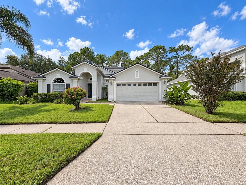 Photo of 936 Oak Chase Drive, Orlando, FL 32828 (MLS # O6444236)