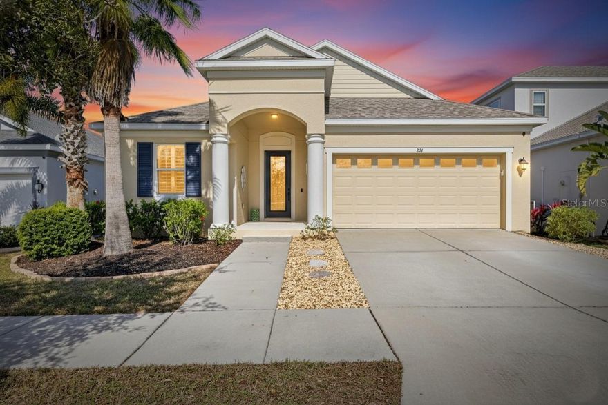 One or more photo(s) has been virtually staged. 211 Shell Creek Ct, Apollo Beach, FL 33572 | 4 Bedrooms | 2 Bathrooms | 2-Car Garage | Gated MiraBay – Admiral Pointe
Located in the gated Admiral Pointe area of MiraBay, this move-in-ready Florida-style home offers an open, functional layout with high ceilings, energy-efficient windows, and a combination of tile and luxury vinyl flooring throughout. Designed for both everyday living and entertaining, the home features four bedrooms, two full bathrooms, and a spacious two-car garage.
The kitchen is well-appointed with 42" upper cabinetry, upgraded granite countertops, stainless steel appliances, a natural gas range, and a center island with bar seating, opening seamlessly to the main living areas. The family room is filled with natural light and features a tray ceiling and dual sliding glass doors that lead to the screened lanai.
The primary suite offers a private retreat with a walk-in closet, dual granite vanities, a large walk-in shower with rain showerhead, and a separate water closet. Secondary bedrooms are generously sized and versatile, ideal for guests, a home office, or additional living space.
Additional features include a dedicated laundry room with folding counter and hanging space, tankless gas water heater, upgraded lighting and fixtures, and a garage equipped with overhead storage and a utility sink. The fenced backyard is professionally landscaped, partially pavered, and includes an irrigation system, providing a private outdoor space for relaxation or entertaining.
Residents of Admiral Pointe enjoy access to a private clubhouse and heated year-round pool, in addition to full use of MiraBay’s resort-style amenities. MiraBay features a grand clubhouse, fitness center, café with full liquor license, basketball and tennis courts, multiple playgrounds and parks, an Olympic-style pool with waterslide, and a 135-acre lagoon for kayaking and paddleboarding.
Conveniently located near Tampa, St. Petersburg, Sarasota, Bradenton, and Orlando, this home offers an exceptional blend of lifestyle, amenities, and location. Experience resort-style coastal living in one of Apollo Beach’s most desirable waterfront communities.
