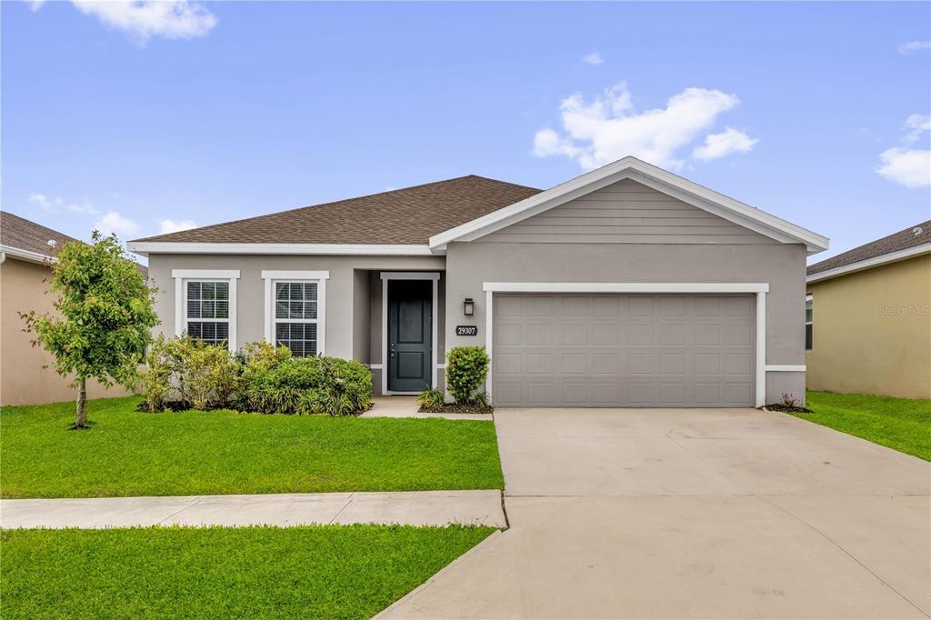 Photo of 29307 Meadowcroft Avenue, Wesley Chapel, FL 33544 (MLS # O6396604)