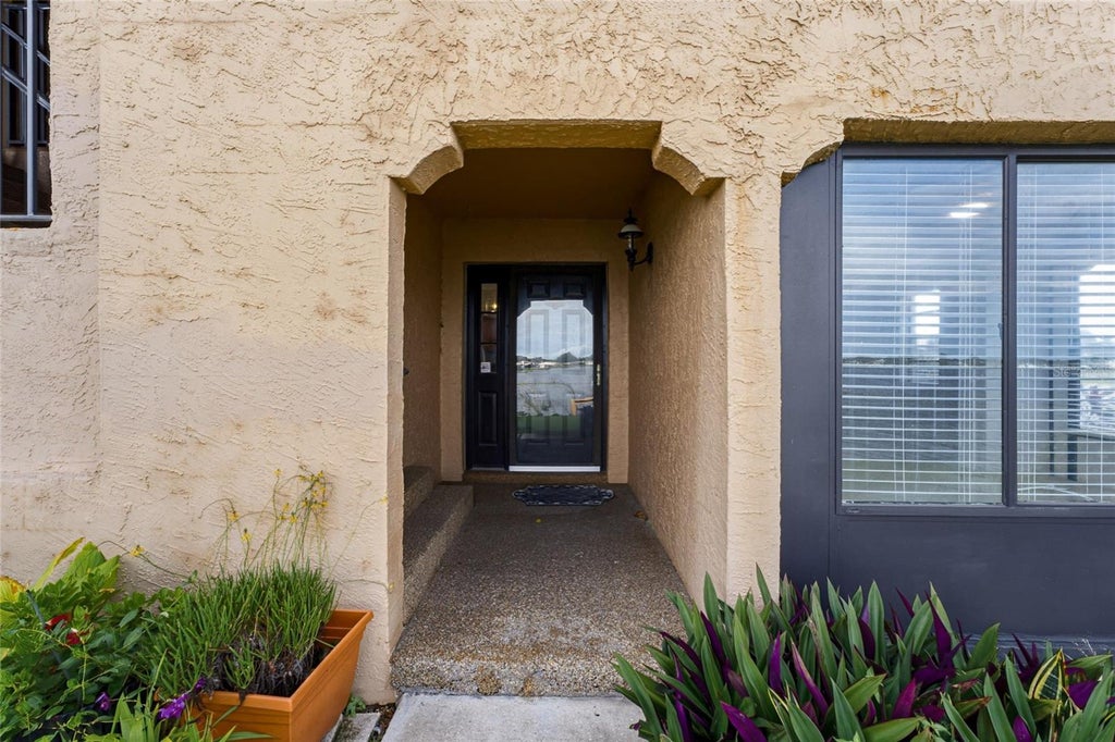 Photo of 10142 Seminole Island Drive, Largo, FL 33773 (MLS # TB8556780)