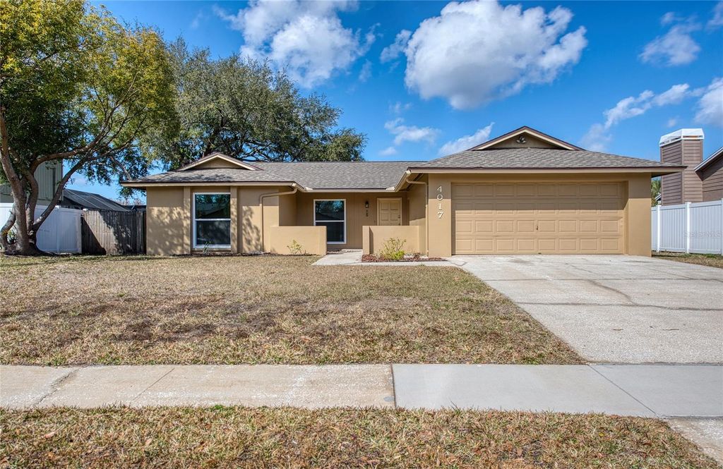 Photo of 4017 Braesgate Lane, Tampa, FL 33624 (MLS # TB8476206)