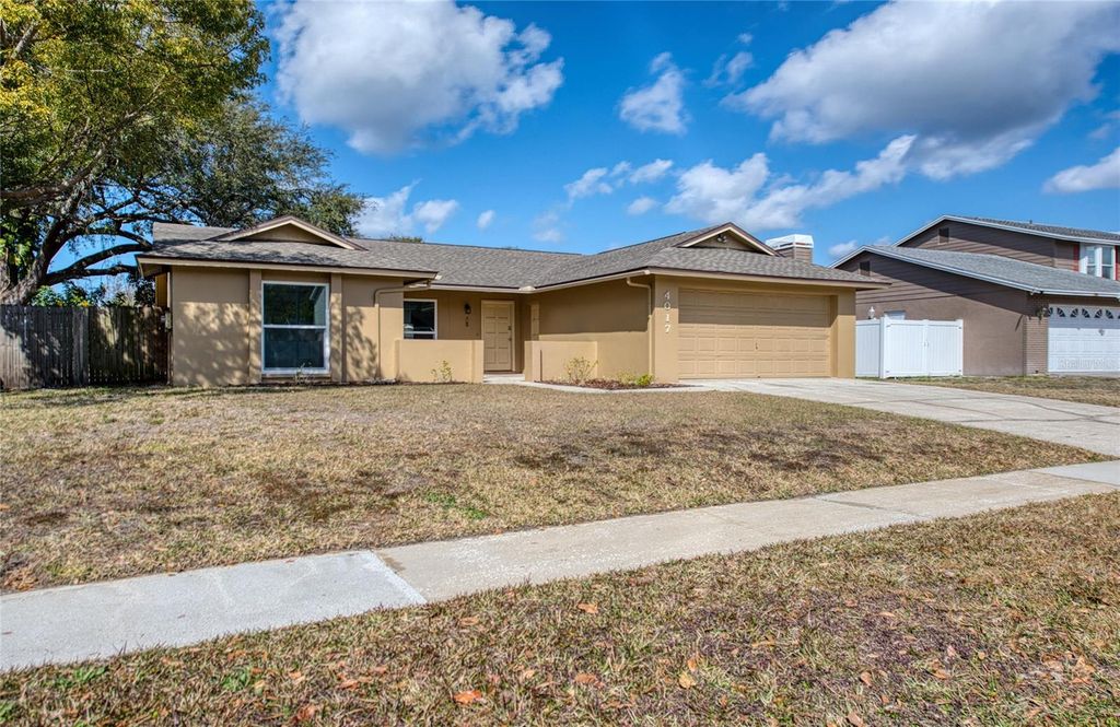 Photo of 4017 Braesgate Lane, Tampa, FL 33624 (MLS # TB8476206)