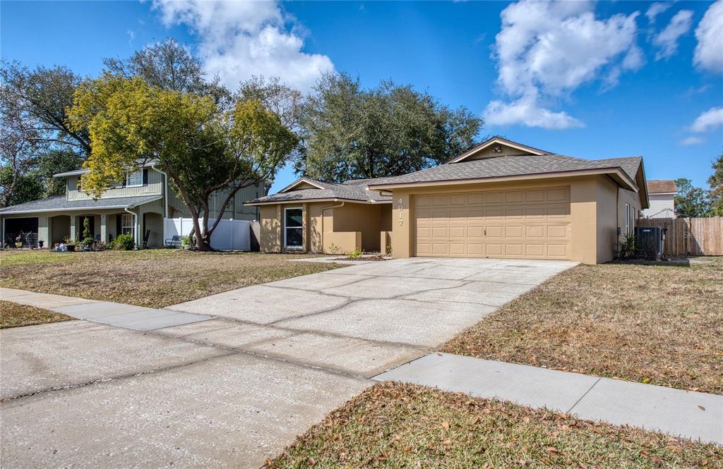 Photo of 4017 Braesgate Lane, Tampa, FL 33624 (MLS # TB8476206)