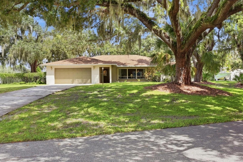 Photo of 7963 N Leewynn Drive, Sarasota, FL 34240 (MLS # A4706848)
