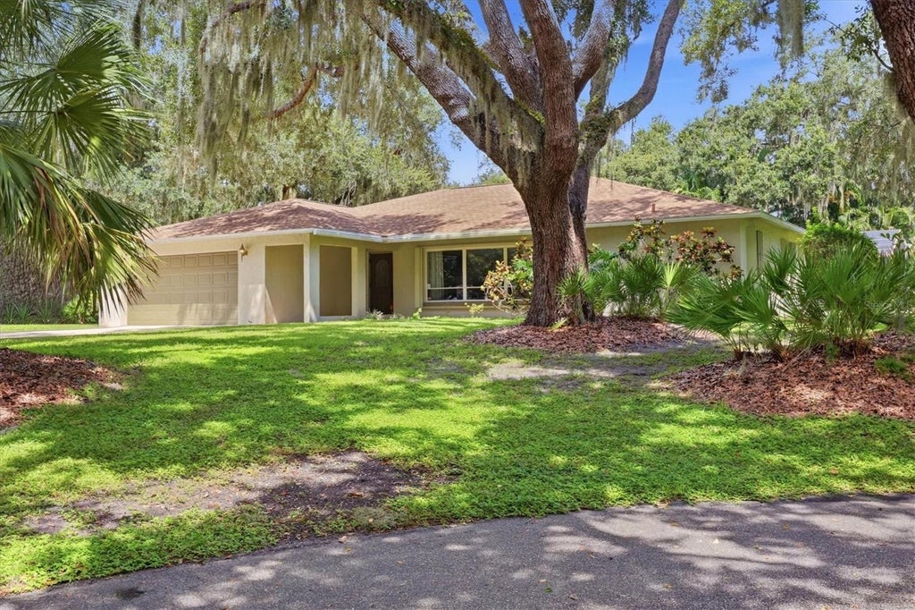 Photo of 7963 N Leewynn Drive, Sarasota, FL 34240 (MLS # A4706848)