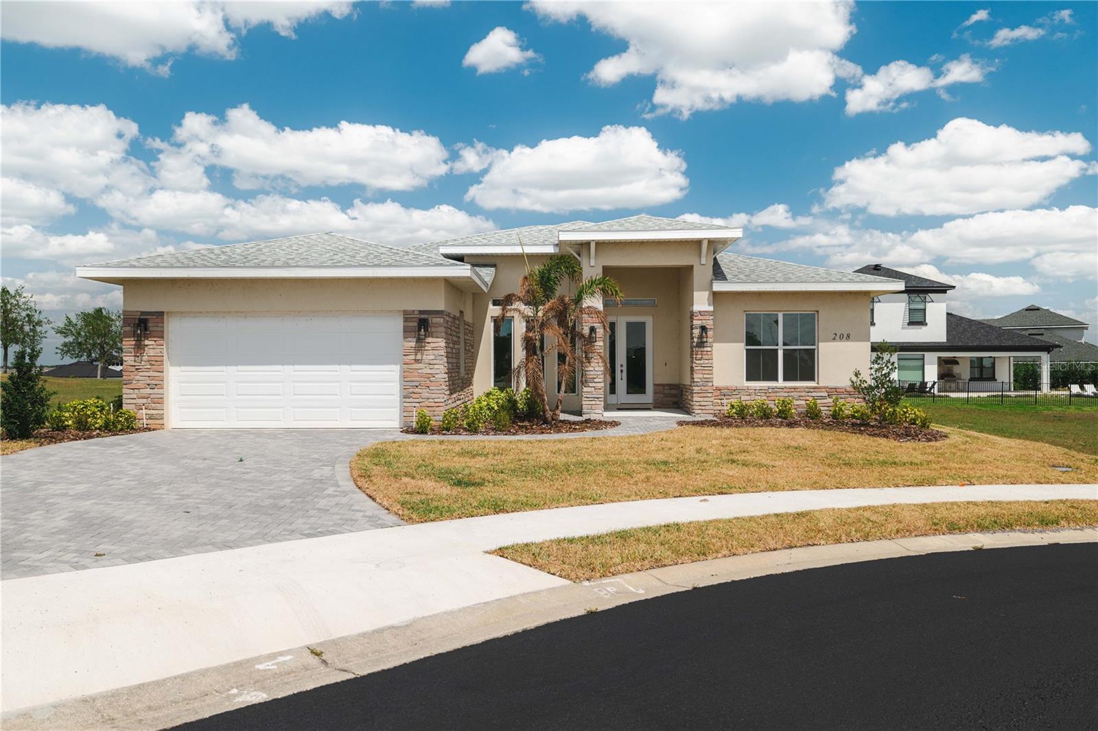 Stunning new 2024 construction in the heart of Lake Alfred! This beautifully designed 5-bedroom, 3-bath home offers 1,885 sq ft of comfortable living space and over 2,490 sq ft under roof. Featuring an open-concept layout, a modern kitchen with granite countertops and a large center island, and a bright living area perfect for entertaining. The spacious primary suite includes a walk-in closet and dual vanities. Enjoy a covered lanai, 2-car garage, and quality finishes throughout. No HOA and just minutes from I-4, parks, and local shops—don’t miss this move-in ready gem!