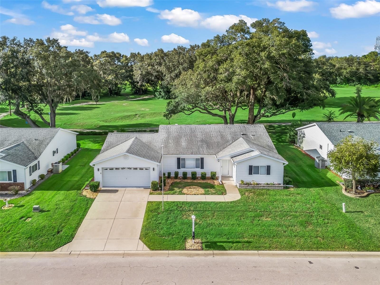 Welcome home to Central Florida, Stunning Views & Serene Privacy in Spruce Creek South!
2 Beds | 2 Baths | Den | Florida Room with River Rock, Laundry room inside the home, Outdoor Patio with River Rock also plus a 2-Car Garage | 1,730+ Sq Ft
Welcome to your dream home in the heart of Spruce Creek South, a highly sought-after 55+ gated golf community just 2 miles from The Villages. Tucked away on a quiet street, this beautifully maintained home backs to a peaceful wooded area with no rear neighbors — offering rare privacy and breathtaking views of nature.
Step inside to discover soaring ceilings, abundant natural light, and over 1,730 square feet of open, airy living space. The spacious living room seamlessly flows into a formal dining area, perfect for entertaining. The bright eat-in kitchen features a solar tube, ample cabinetry, generous counter space, updated stainless steel appliances, and a peninsula with bar seating — plus a cozy breakfast nook to enjoy your morning coffee.
Need extra living space? The light-filled den is surrounded by windows overlooking mature oaks and lush landscaping — an ideal spot to relax, read, or work from home. Just beyond, the private enclosed florida room with glass - provides the perfect place to unwind with a morning brew or a glass of your favorite drink after a round of golf.
The oversized primary suite boasts a large walk-in closet and en-suite bath with walk-in shower and extended vanity. The guest bedroom also includes a walk-in closet and is conveniently located next to the second full bath, complete with a tub/shower combo and solar tube lighting.
Notable Updates & Features:
New A/C (2021)
Roof (2011)
Newer Washer & Dryer
Newer water heater
Newer Water Filtration Osmosis system and Water purifier system.
Updated Appliances & Window Treatments
Fresh Paint Throughout
All-New Landscaping
Fenced in yard, for your furry baby(s).
Oversized 2-Car Garage with Extra Storage and a bonus Evolution 2020 Golf Cart is included, as shown in pictures Conveys with this sale.
Live the golf cart lifestyle with easy access to nearby medical offices, restaurants, supermarkets, retail shops, and all the entertainment of The Villages — just minutes away.
Spruce Creek South offers resort-style amenities, including:
Clubhouse with fitness center, his & hers sauna, card game rooms, entertainment center with stage, kitchen, billiard room, outdoor picnic area with
Outdoor pool & jacuzzi
Fitness & activity rooms
Softball field
18-hole golf course
Gated storage for RVs and extra vehicles (at a low cost)
Dozens of clubs, social events & more to enjoy year round!
This Home Offers:
Gorgeous Views. Total Privacy. A Prime Location.
Don’t miss your chance to own this slice of Florida paradise — schedule your private tour today!
Enjoy the pictures and the slideshow, call your agent with any questions.