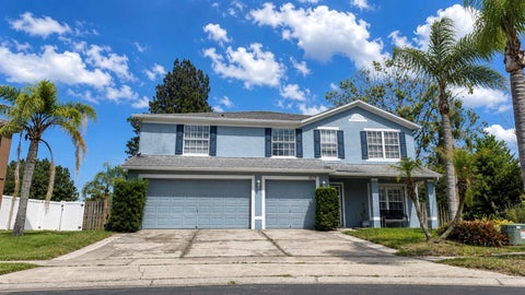 Photo of 1042 Horseshoe Falls Drive, Orlando, FL 32828 (MLS # O6400464)