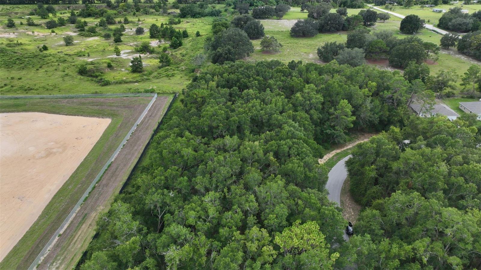 This 0.57-acre lot in the Marion Oaks community offers paved road frontage, flat terrain, and nearby power —ready for your custom single-family home. With a generous 2,200 sq ft minimum build requirement, the property provides plenty of space for a comfortable residence. Water and sewer will require private well and septic installation. Located just south of downtown Ocala and minutes from I-75, this lot combines neighborhood privacy with quick access to shopping, schools, and healthcare. Gainesville and The Villages are within an easy drive, making it a convenient base for work, family, or retirement living. With no flood zone and only a $10 annual HOA fee, this parcel is an affordable opportunity to secure land in a growing Florida community.