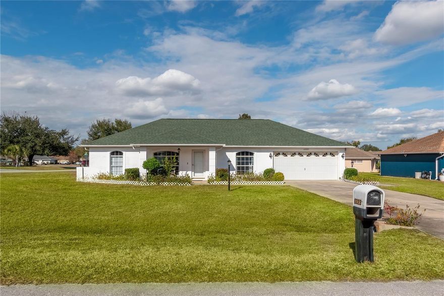 Perfectly tucked away in a hidden but conveniently located neighborhood is this great single-family home. This home is  just minutes from town with easy access to SR 200 and nearby shopping. At  1,450 sq ft the home features an open living area and a desirable 2-bedroom, 2-bath split floor plan—perfect for a first-time homebuyer or a retired couple looking to downsize. The enormous galley kitchen offers abundant counter space and cabinetry, ideal for cooking and entertaining. There is a sit in area for everyday living in the kitchen or a formal dining room for entertaining. This corner lot is situated on a cul-de-sac.  The home also boasts a newer roof (2020), newer water heater, and a recently pumped septic system. Enjoy your  nice-sized yard and relax on the covered back porch.  Customize this home with fresh paint and start enjoying your new home today!