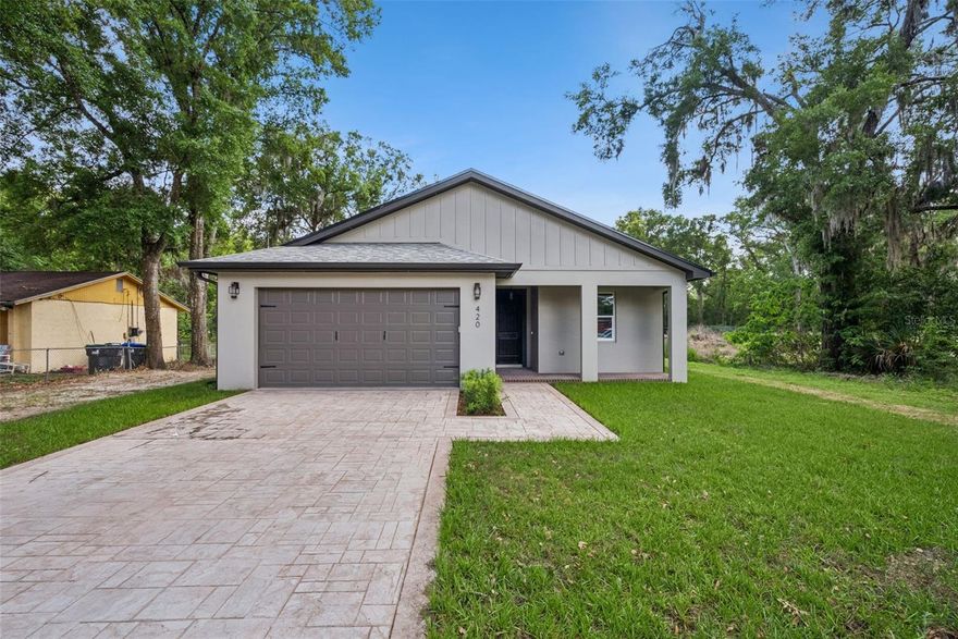 Welcome to your dream home in the heart of one of Central Florida's fastest growing cities! This stunning brand new construction at 420 E 10th St, Apopka, FL 32703 is everything you have been looking for and more. Sitting on a generous 1/3 acre lot with absolutely NO HOA, this gorgeous 3 bedroom, 2 bathroom, nearly 2,000 sq ft home gives you the space, freedom, and luxury you deserve without the restrictions. From the chef inspired kitchen featuring a pot filler to the spa-like walk-in shower, every detail in this home was thoughtfully designed. Every room comes equipped with a ceiling fan for year round comfort, and the best part is that brand new appliances AND a washer and dryer are all included! Just unpack and enjoy because it truly does not get more turnkey than this. Located in booming Apopka with easy access to top rated schools, shopping, dining, and major highways, this is your chance to own a piece of one of Central Florida's most exciting growing cities. Homes like this do not last long so schedule your private showing today! ??