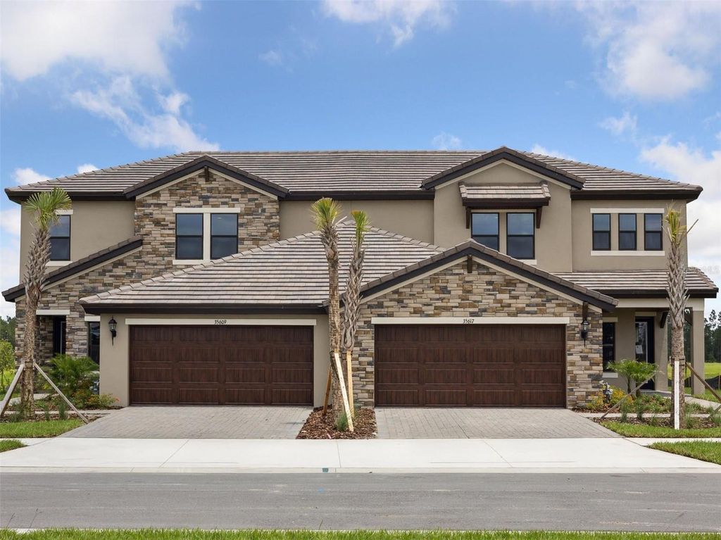Photo of 35609 Stableton Ln, Zephyrhills, FL 33541 (MLS # TB8386827)