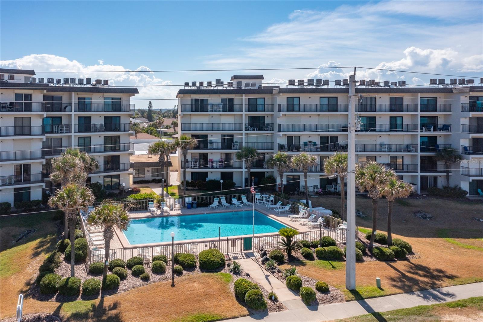Experience Coastal Bliss at Ocean Watch in Ormond Beach - Discover the perfect blend of luxury and seaside living with this beautifully updated 2-bedroom condo at Ocean Watch. Overlooking the breathtaking Atlantic Ocean, this home offers stunning views, modern upgrades, and resort-style amenities for effortless beachside living. Inside, the condo exudes style and comfort, featuring quartz countertops, brand-new vinyl plank flooring, and a spacious master suite with a walk-in closet and private bath. Recent upgrades include a new stainless steel fridge and dishwasher installed in 2023, along with updated plumbing fixtures. The condo has been meticulously maintained, with a new slider and updated furniture in 2021, and a new HVAC compressor and condenser installed in 2022 for year-round comfort. Beyond the stunning interior, Ocean Watch offers an array of resort-style amenities, including an inground pool, sauna, BBQ area, car wash station, private beach access, and onsite staff.
Step outside to the pristine sands and sparkling waters of Ormond Beach, your backyard paradise. Whether you're sunbathing, strolling along the shore, or simply enjoying the view, every day feels like a getaway. Fully furnished and move-in ready, this condo is your ticket to the coastal lifestyle you've been dreaming of. Schedule your showing today and make this slice of paradise your own!