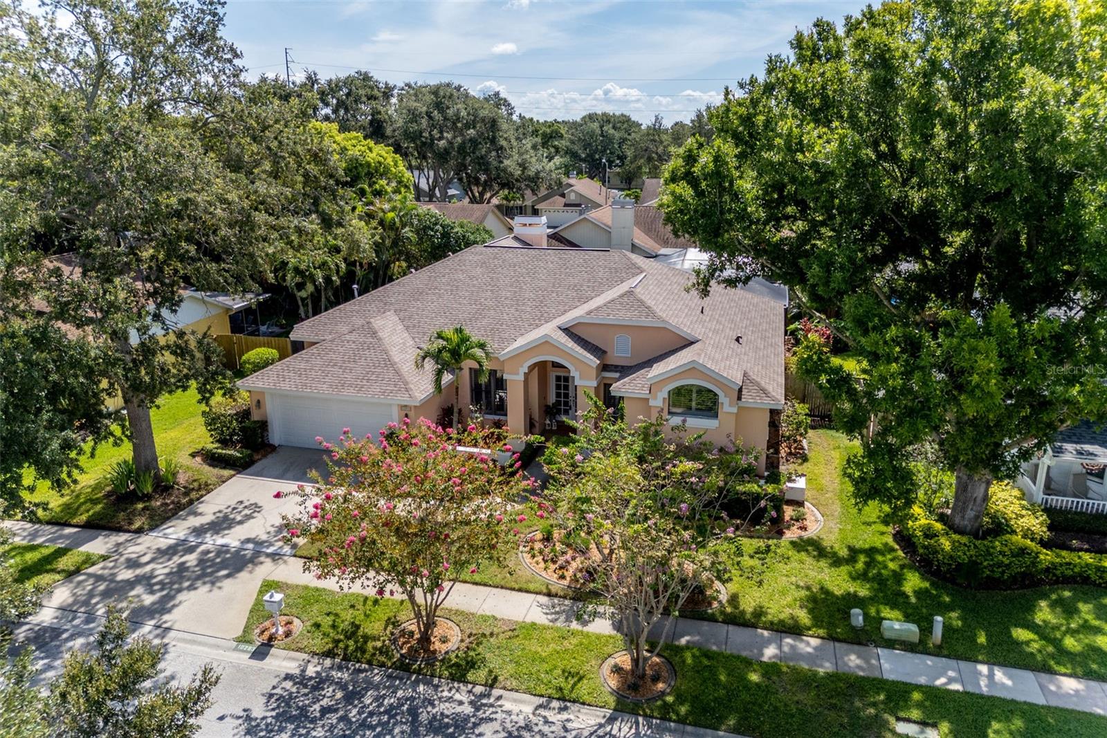 DISCOVER YOUR DREAM HOME in The Woods at Lake Seminole, a hidden gem of a subdivision - of only 103 homes - offering a tranquil escape in the heart of Seminole. This beautiful 4-Bedroom, 2-Bathroom, Pool Home welcomes you with a fantastic open-concept Kitchen and Family Room area, perfect for modern living and entertaining. The well-appointed Kitchen boasts sleek granite countertops, a convenient Breakfast Bar, and a spacious walk-in pantry, sure to delight any home chef. Enjoy the flexibility of a separate Living Room and Formal Dining Room, providing ample space for gatherings of all sizes. The split floor plan ensures privacy, with a generously sized Primary Bedroom, featuring a luxurious En-Suite Bathroom, complete with a walk-in closet, a separate water closet, a walk-in shower, and a relaxing bathtub. Outside, your private oasis awaits with a sparkling pool and spa, encased within a brand-new screened enclosure for year-round enjoyment. This home also features wide sidewalks, underground utilities, and a convenient 2-car garage. Its prime location offers unparalleled convenience, just moments from Publix, Bardmoor Outpatient, and ER, as well as many shopping and dining options. Top-rated schools are also within easy reach. Furthermore, you are just a short drive from vibrant downtown St. Pete and the stunning Gulf Beaches—easy Access to Tampa International Airport and Orlando. Washer and Dryer convey with Home. Don't miss the opportunity to experience the best of Seminole living – schedule your private showing today! Room Sizes are approximate, and the Buyer must verify! PLEASE CLICK ON VIRTUAL TOUR!