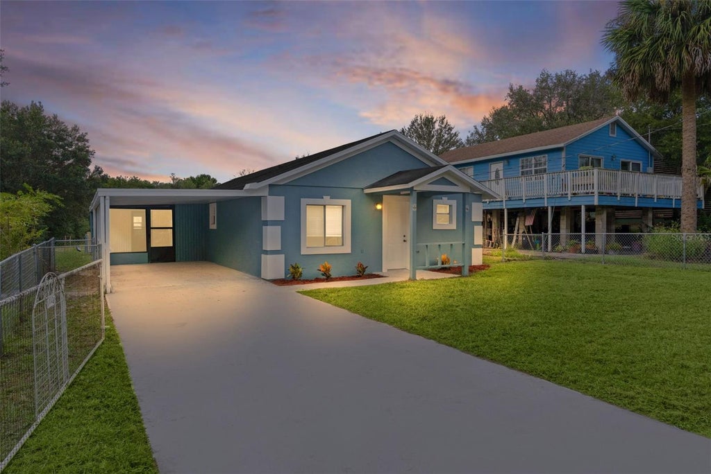Photo of 31128 Lochmore Circle, Mount Plymouth, FL 32776 (MLS # O6444728)