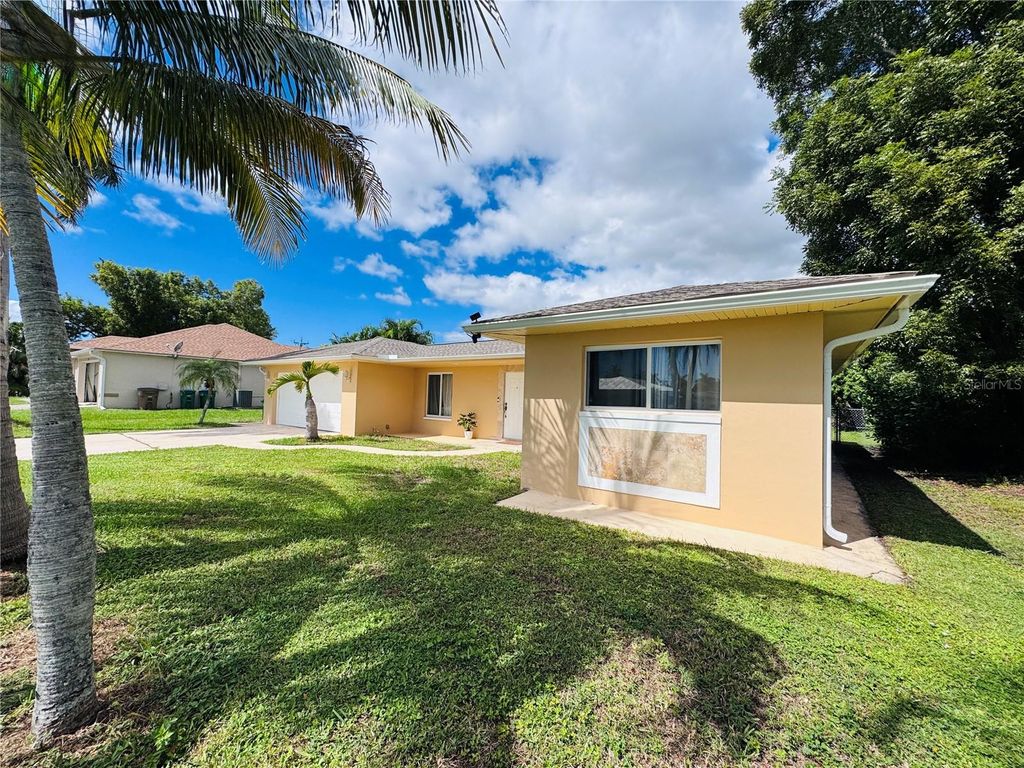 Photo of 141 SW 48th Terrace, Cape Coral, FL 33914 (MLS # A4668938)